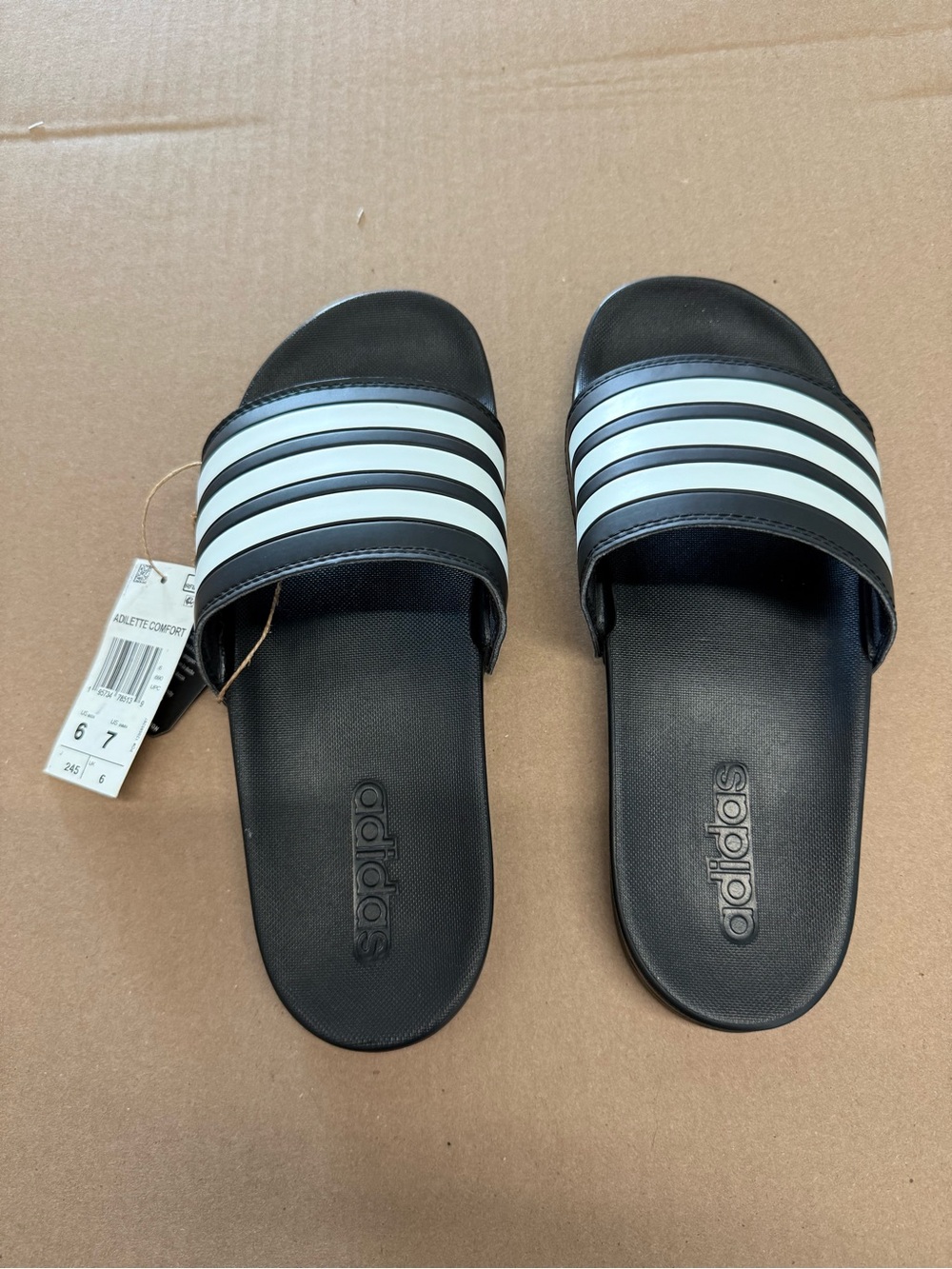 Adidas Kids' Black Slide Sandals with White Stripes